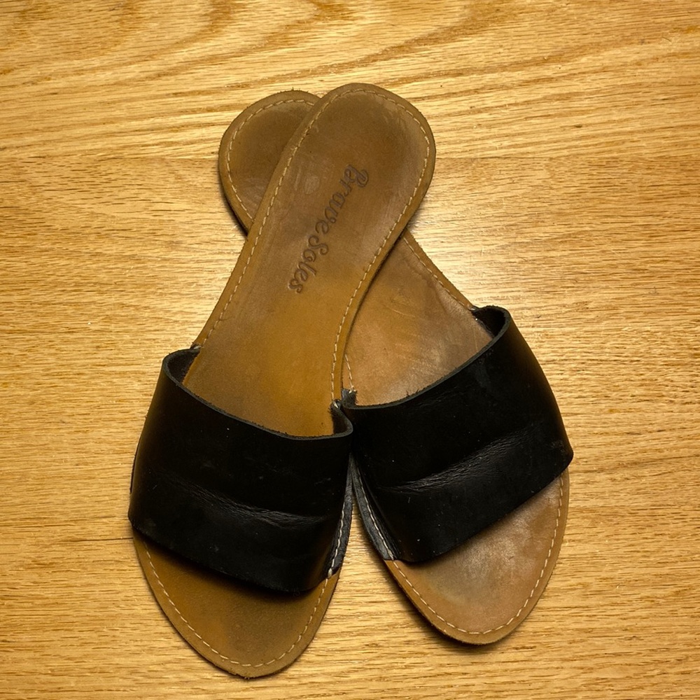 Black minimalist leather sandals